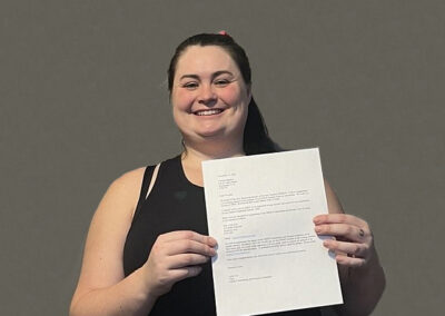 Girl holding a typed letter