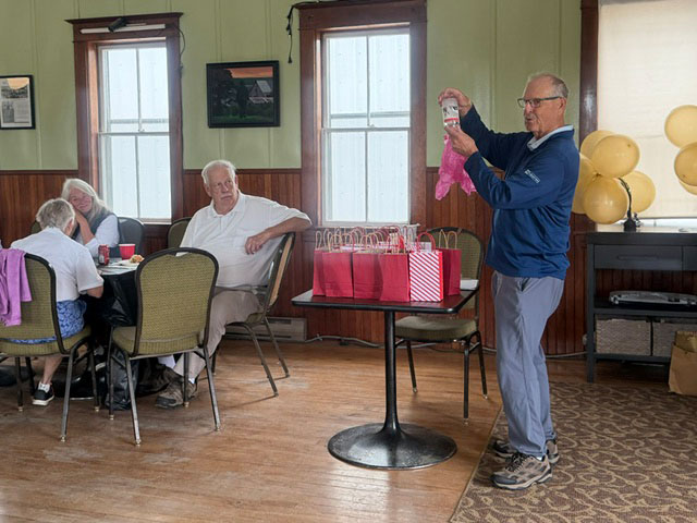 Person showing gift bags